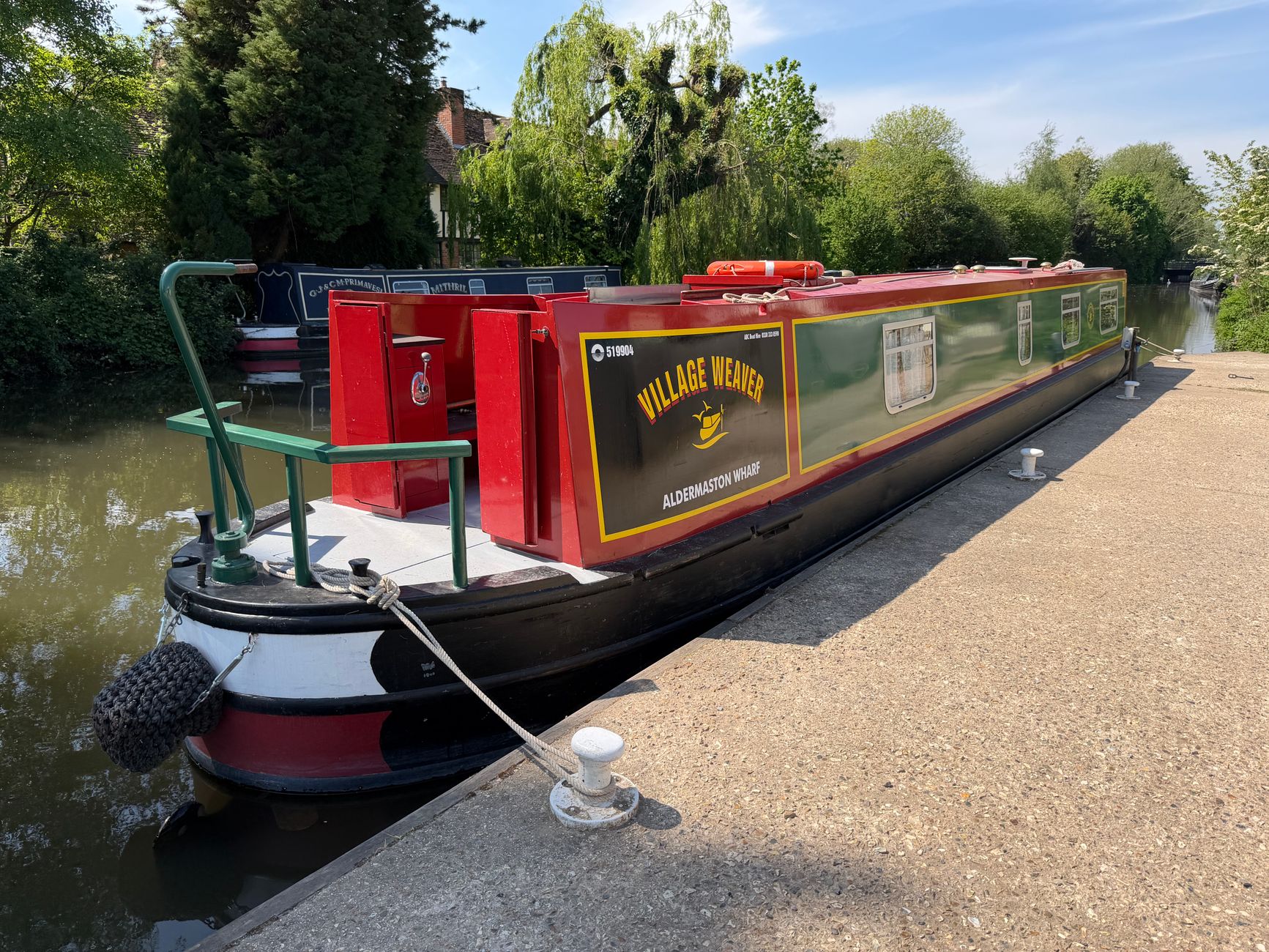 Person operating a canal lock windlass during a UK canal boat holiday