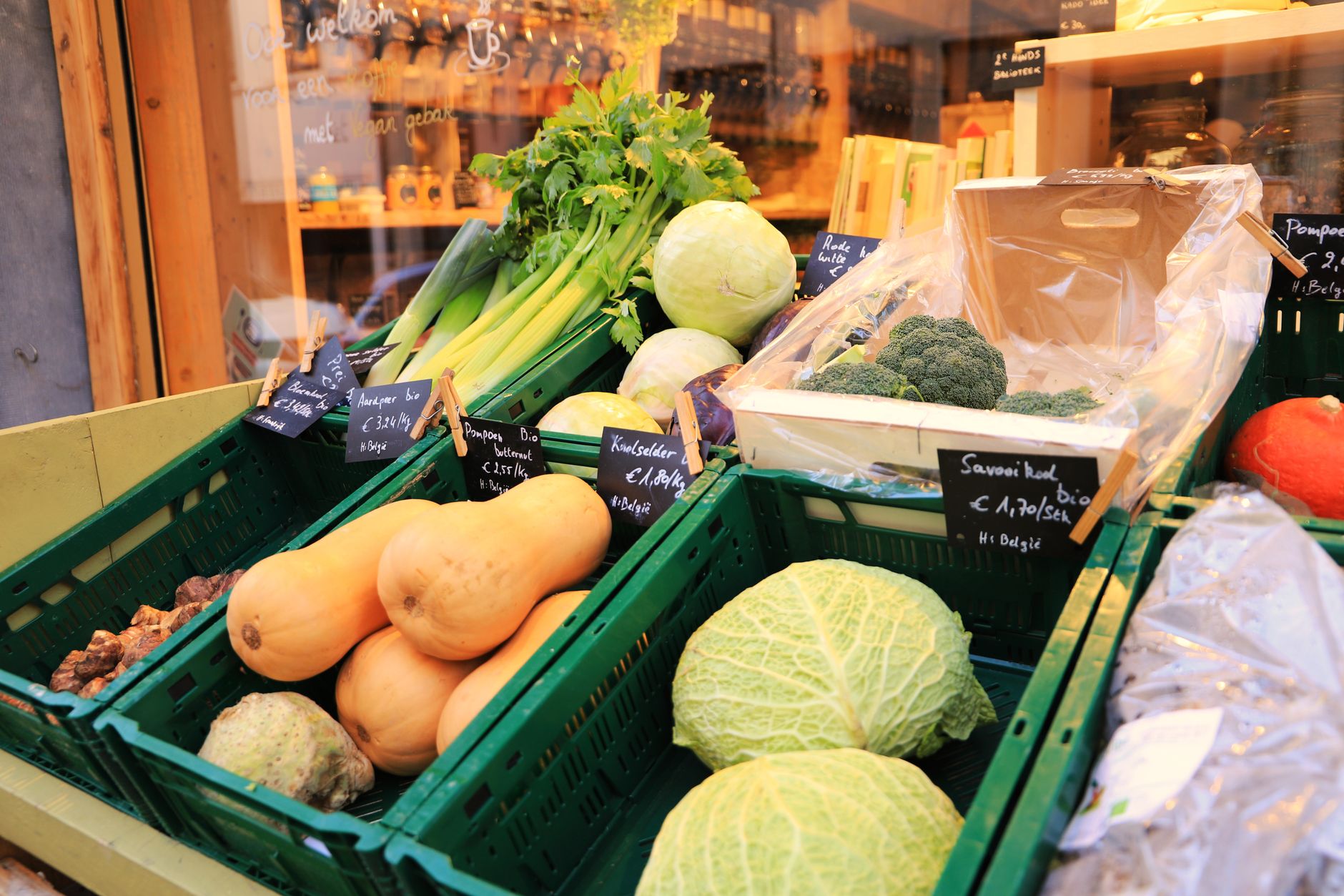 Farm shop shelves filled with local cider and preserves at a uk orchard to visit summer 2026