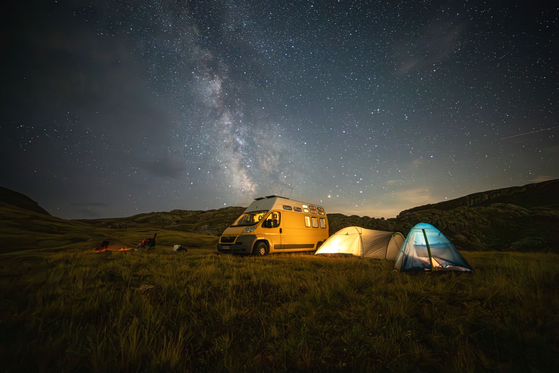 Tent pitched under the Milky Way at a dark sky campsite UK summer stargazing trip